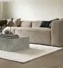 Wie man einen Teppich in einem Wohnzimmer platziert