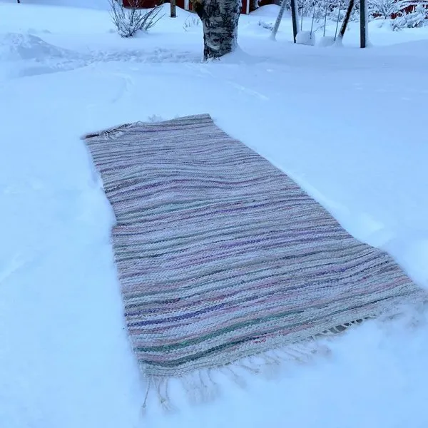 Schneewaschen des Teppichs
