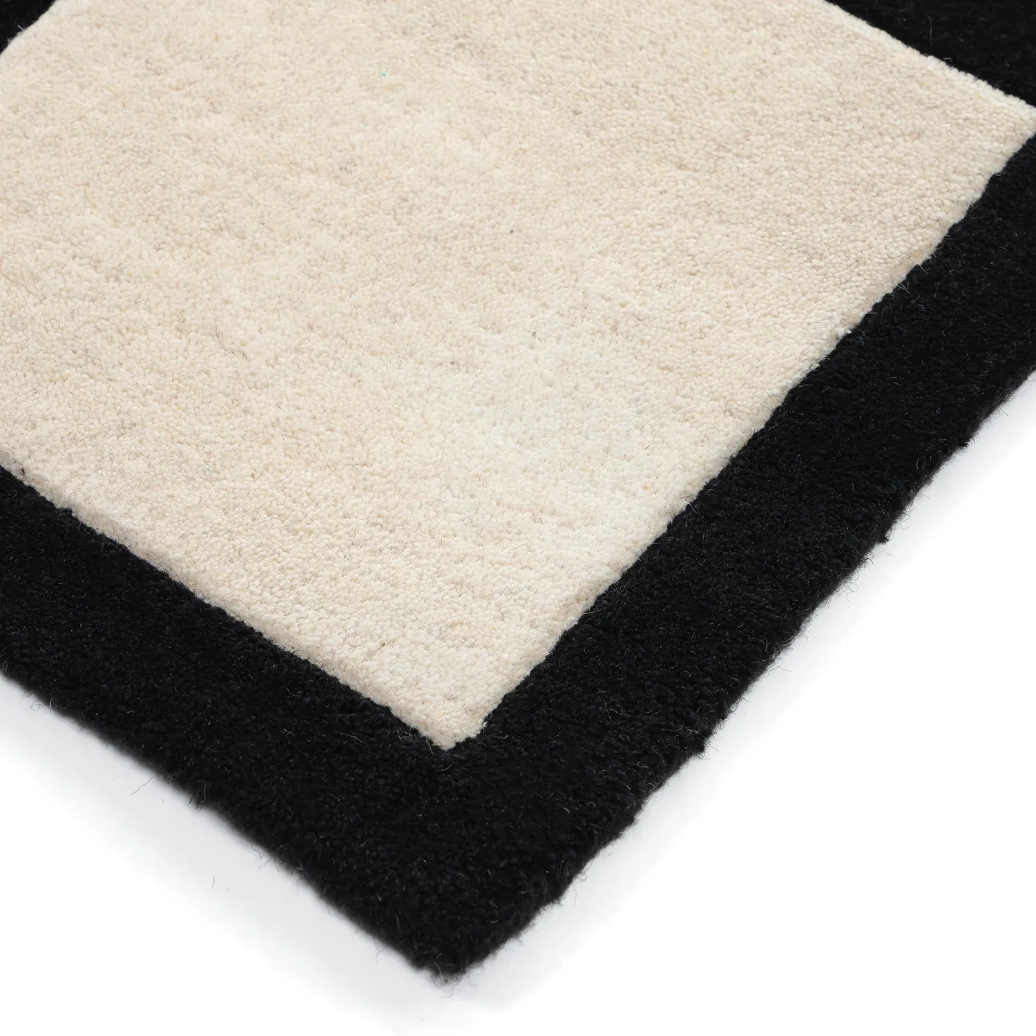 Wollteppich - Syl Hand Tufted Wool Premium (schwarz/weiß)